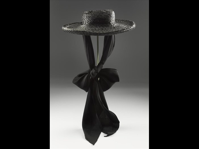 Woman's black straw hat designed by Elsa Schiaparelli, late 1930s. You can see this hat in the Fashion and Style gallery at the National Museum of Scotland.