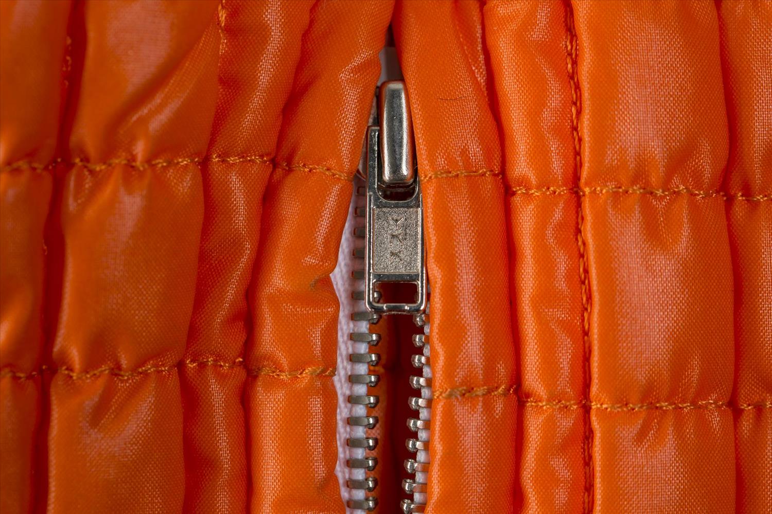 Detail of orange jacket belonging to Shirley Manson.