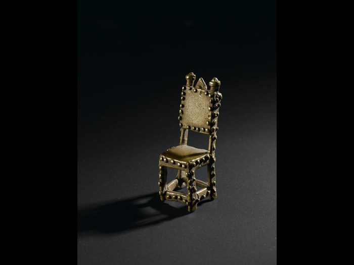 Cast brass goldweight representing a chief's asipim chair: West Africa, Ghana, Asante, late 19th century