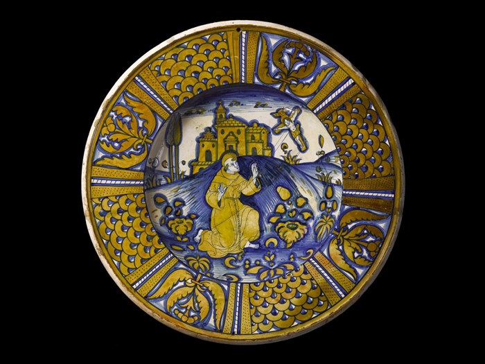This 16th-century maiolica dish from Italy shows St Francis of Assisi.