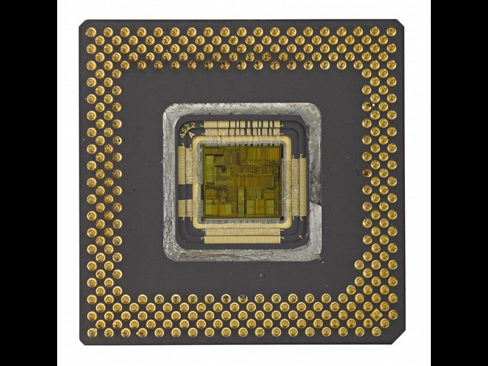 Ceramic is used to make this 1994 Intel Pentium microprocessor, which contains 3,200,000 transistors.