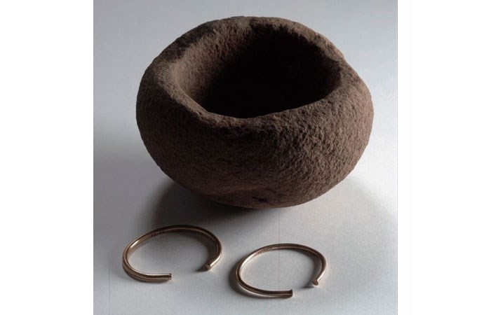 The Hillhead gold bracelets and stone bowl.