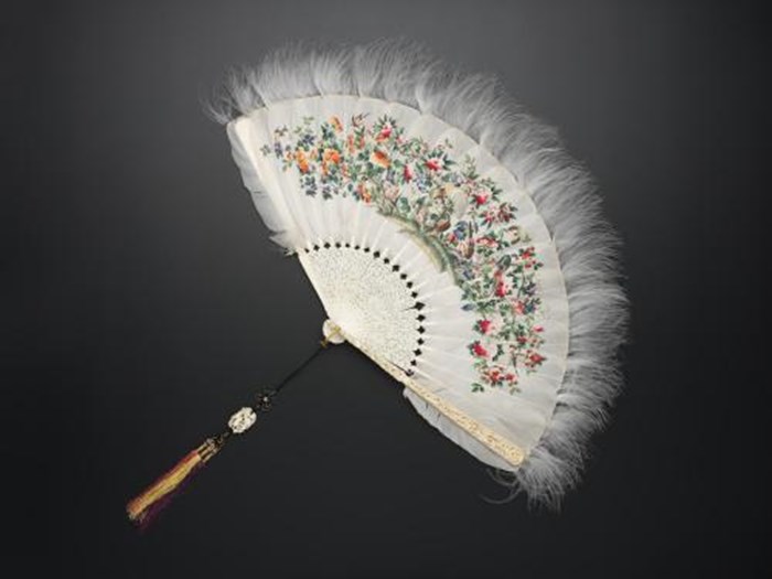Fan with mount formed of goose feathers painted with different motifs with ivory sticks and guards and a silk tassel: China, Canton, 19th century.
