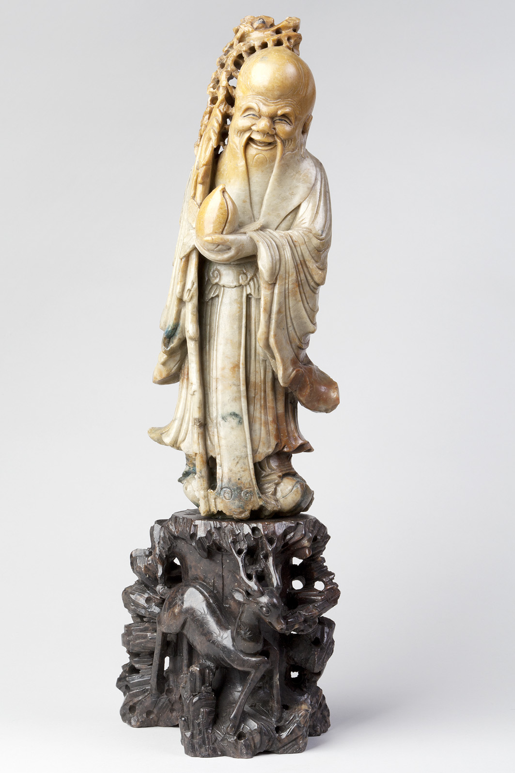 Chinese Figure of Shou-Lao Holding a Peach. Qing Dynasty, 19th Century. James Cromar Watt bequest, 1941. © Aberdeen City Council (Art Gallery and Museums Collections)