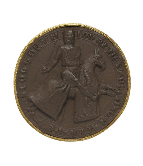 Hazelnut brown circular seal with a knight on a horse wielding a sword surrounded by Latin script.