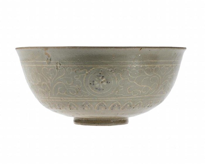 Stoneware bowl inlaid with underglaze inlay (sanggam) floral designs in black and white clay. Korea, Ganghwa Island, 14th - 16th century.