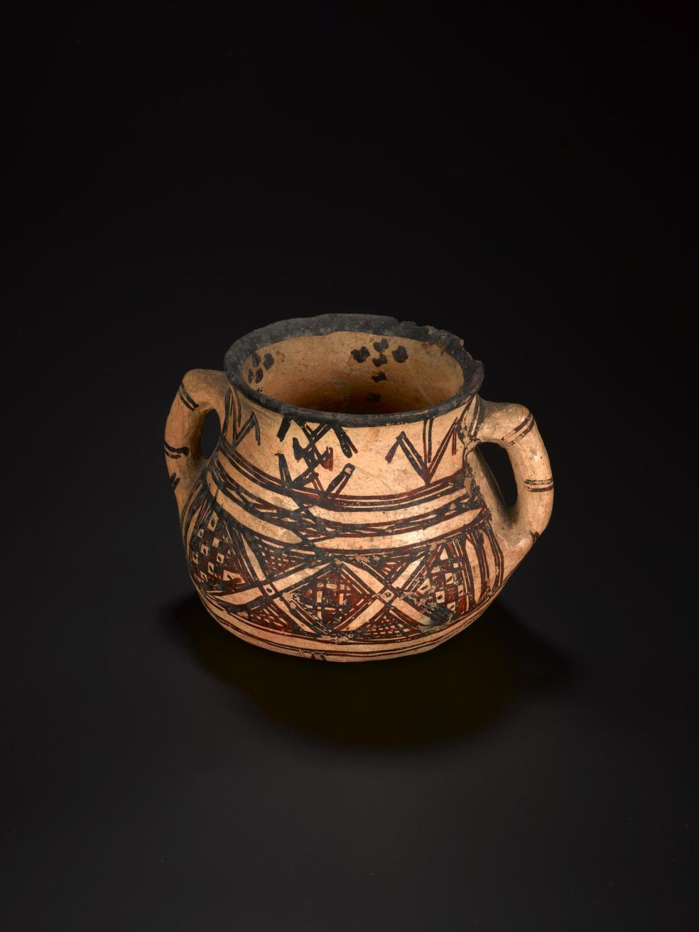 Two-handled milk pot (hallab), made by Imazighen women for domestic use, c1850-1886. One of eight high-quality slip-glazed earthenware vessels in Drummond Hay’s collection from the Rif Mountains. 