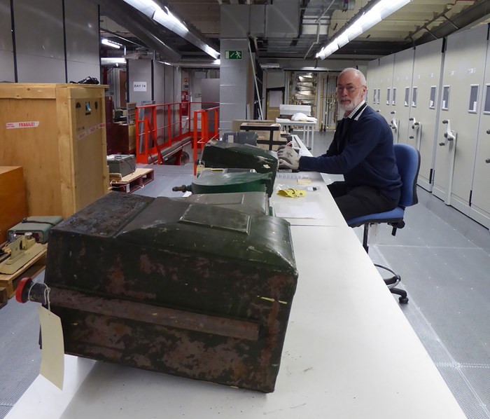John working in the National Museum Collection Centre