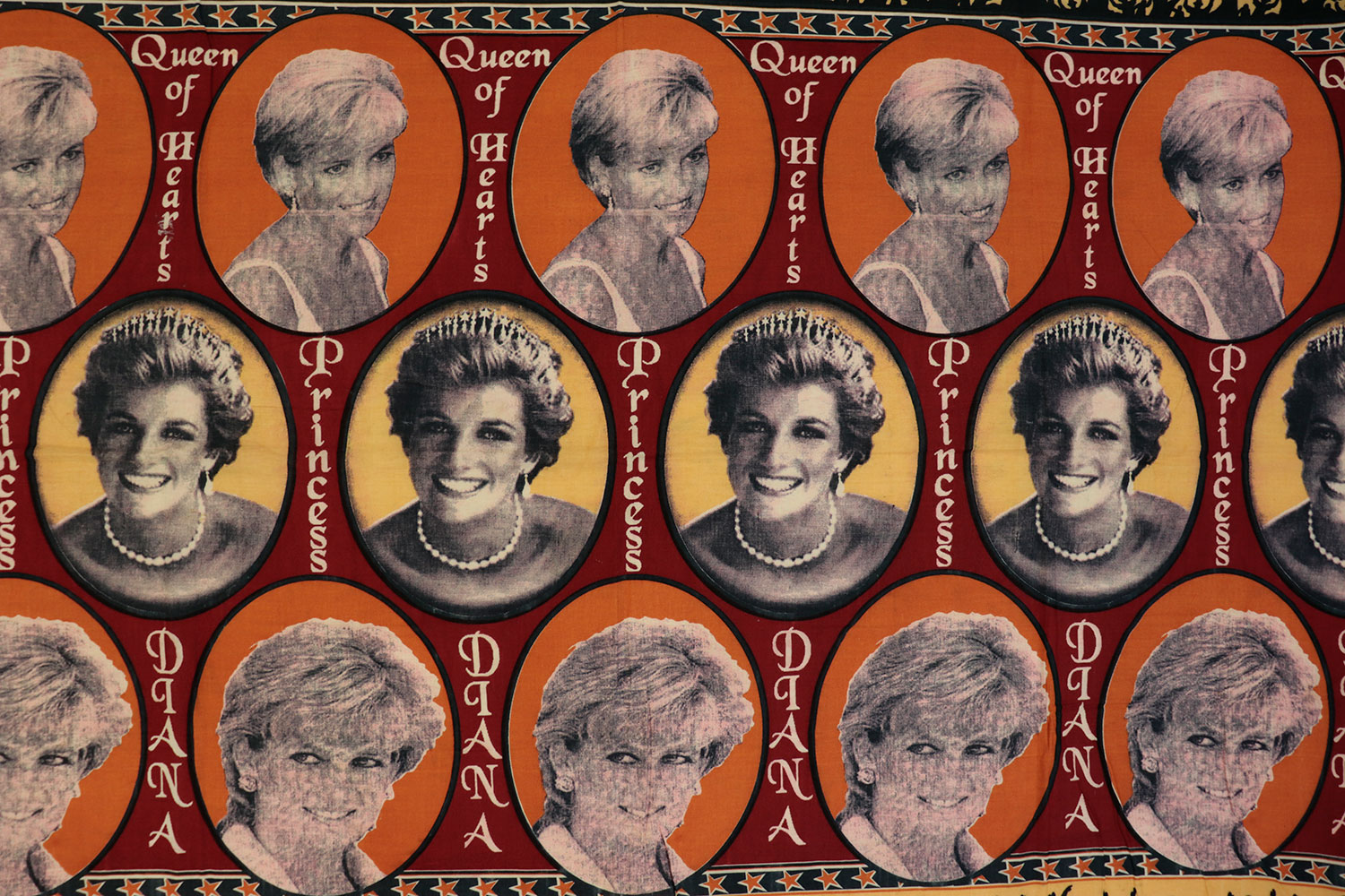 Capulana featuring a repeating pattern of photographic portraits of Princess Diana and the legends 'Queen of Hearts'; 'Princess' and 'Diana': Africa, Southern Africa, Mozambique, 1994-2000.