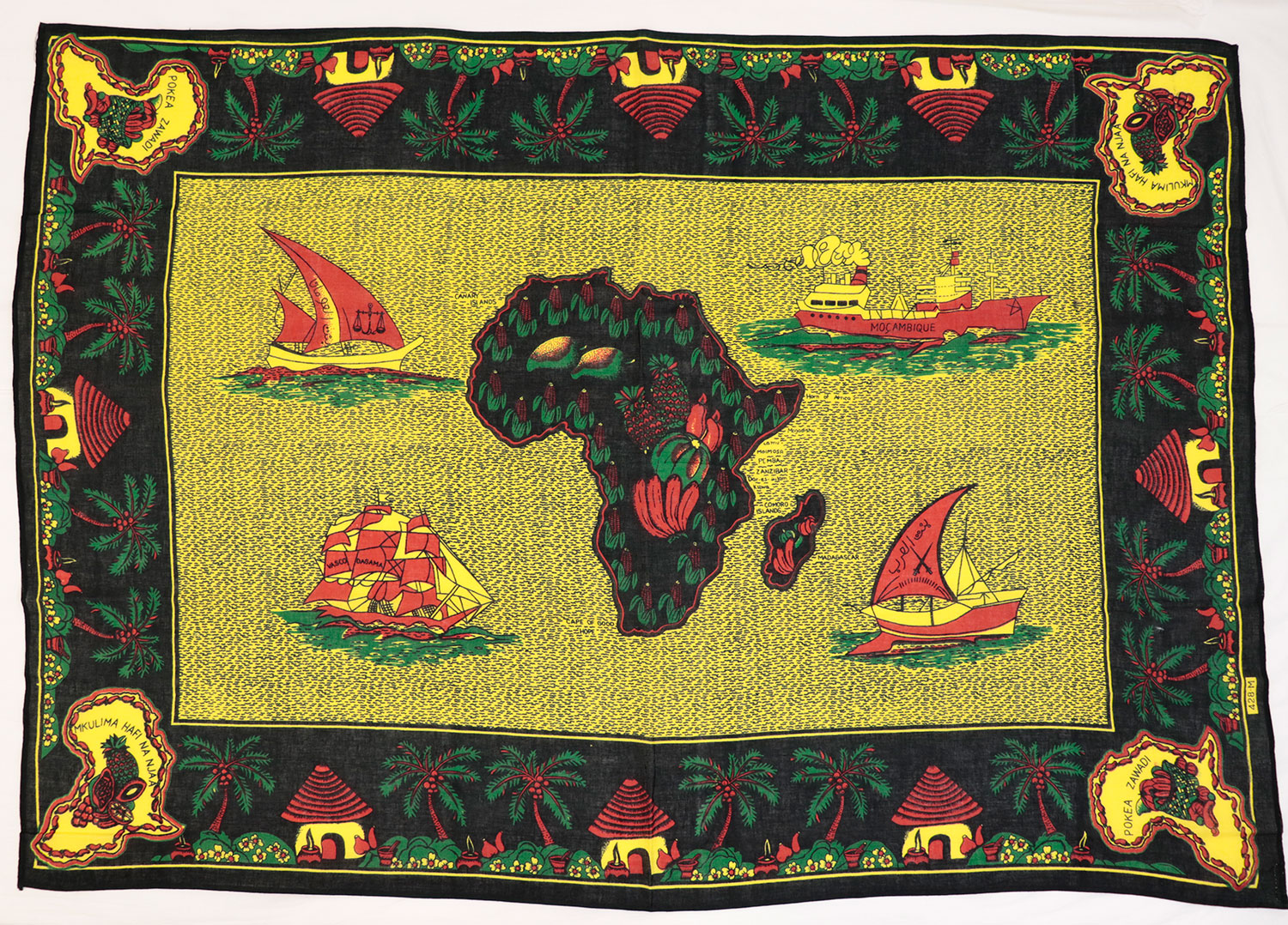 Capulana featuring a rectangular design representing Mozambican sea faring trade with a map of Africa filled with fruits in the centre: Africa, Southern Africa, Mozambique, 1994-2000.