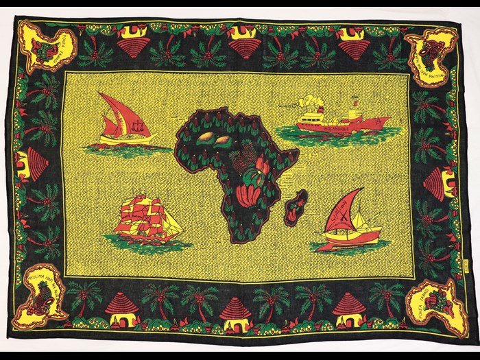 Capulana featuring a rectangular design representing Mozambican sea faring trade with a map of Africa filled with fruits in the centre: Africa, Southern Africa, Mozambique, 1994-2000.