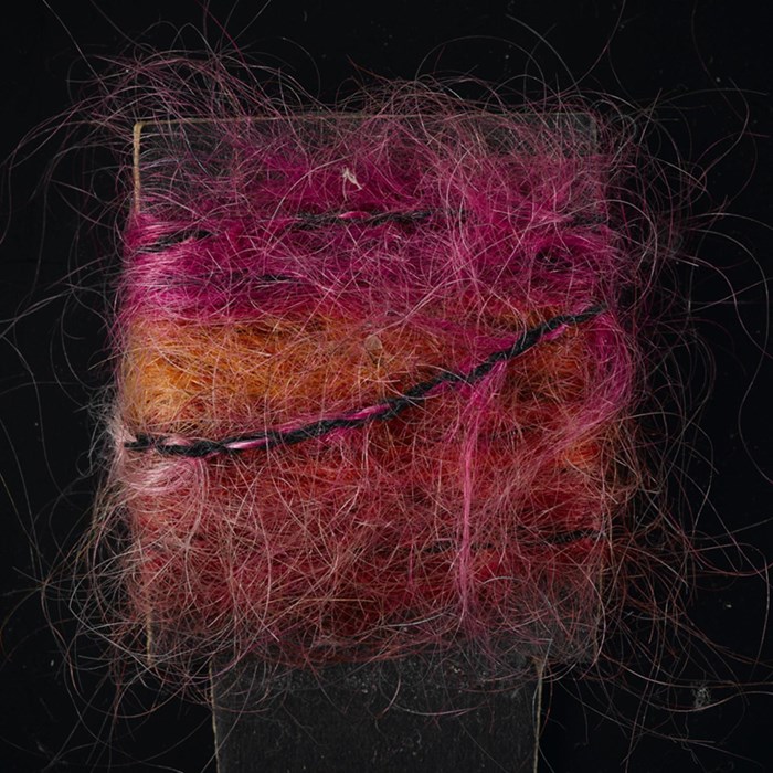 Pink, orange and red mohair sample