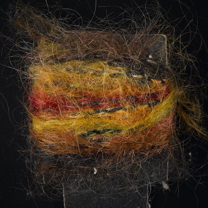 Yellow, brown and red mohair sample