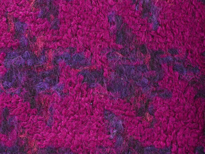 Sample houndstooth mohair tweed, woven in looped brushed mohair and space-dyed brushed mohair yarns and wool and polyester and wool yarns, in purple, pink, dark blue and black.