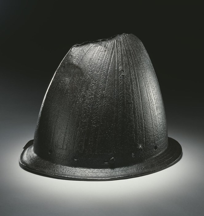 An iron helmet known as a steel bonnet, headgear of the Border raiders. This was found at Ancrum, a stronghold of the Kers.
