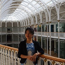 Dr Qin Cao in the Grand Gallery at the National Museum of Scotland