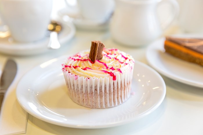 Photo of a cupcake on a plate.