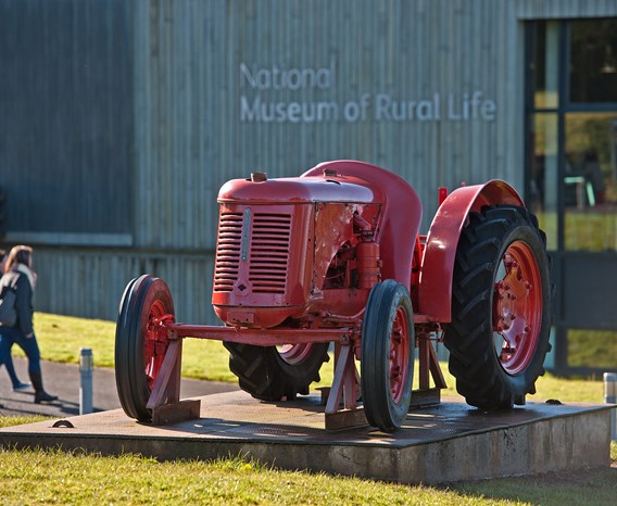 Bright red tractor outside the National Museum of Rural Life