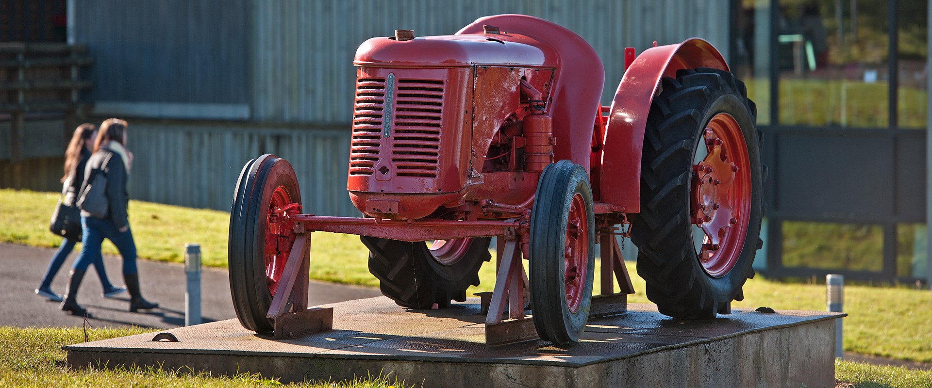 Bright red tractor outside the National Museum of Rural Life