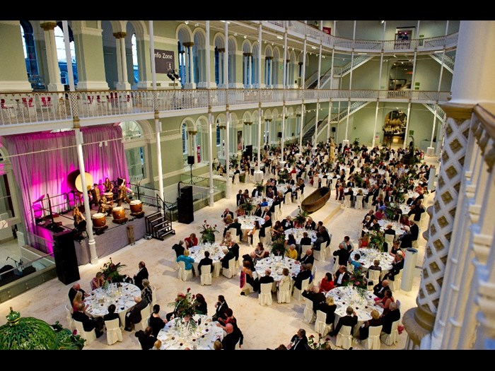 A large dinner in the National Museum of Scotland's Grand Gallery.