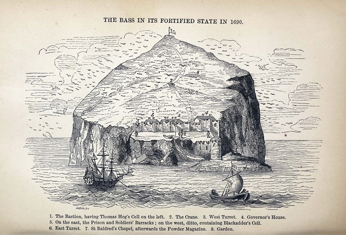Illustration showing a massive rock sticking out of a sea. A castle and prison is on the rock, and two ships sail in front of it.