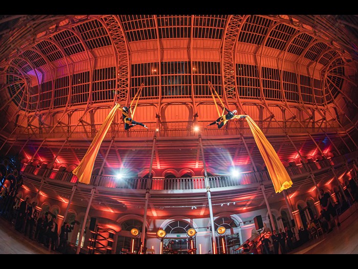 Aerialists perform in the National Museum of Scotland's Grand Gallery.