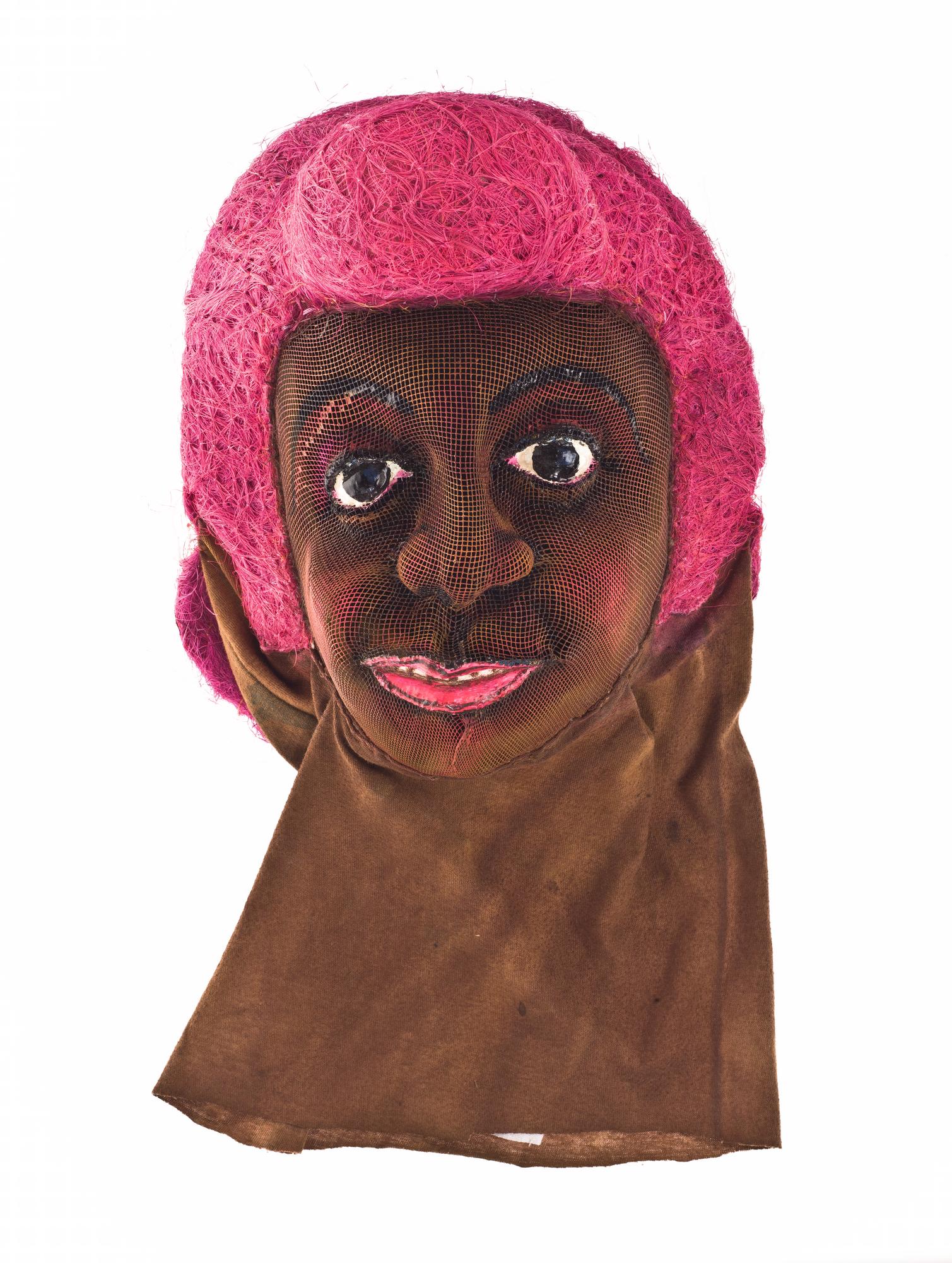 'Fine Lady' face mask with hair of pink dyed sisal and face of painted wire mesh, part of a fancy dress masquerade costume: Africa, West Africa, Ghana, Elmina, by Donatus Archibald Acquandoh (alias Hippies), 2000 