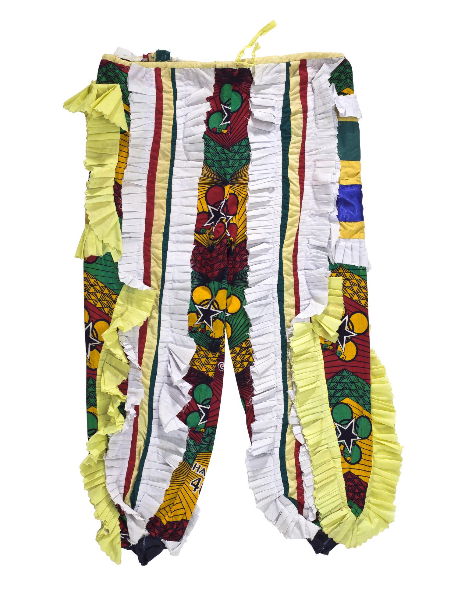 Drawstring trousers to be worn with an Ugly Man fancy dress masquerade costume, made of printed fabric designed to commemorate 40 years of Ghana's independence, purchased from a tailor in Winneba by D.A. Acquandoh (Hippies): Africa, West Africa, Ghana, Elmina, collected in 2000 - 2001 