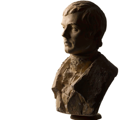 Bust of Robert Burns in profile, with short haircut and jacket.