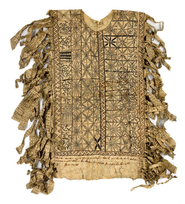 Sleeveless off-yellow poncho with dense black geometric patterns and many weathered fringes on both sides.