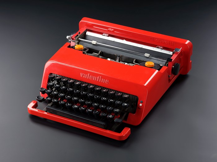 Red Olivetti typewriter.
