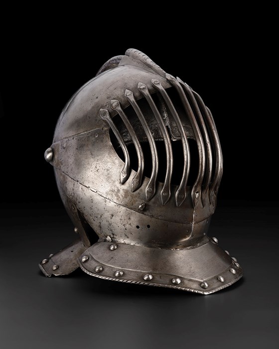 Metal helmet with a visor, like from a knight's suit of armor