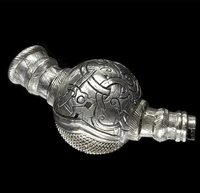 Silver terminal of a ball-type or ‘thistle’ brooch, with engraved ornament and brambling, from the Skaill Hoard, Orkney, 10th century