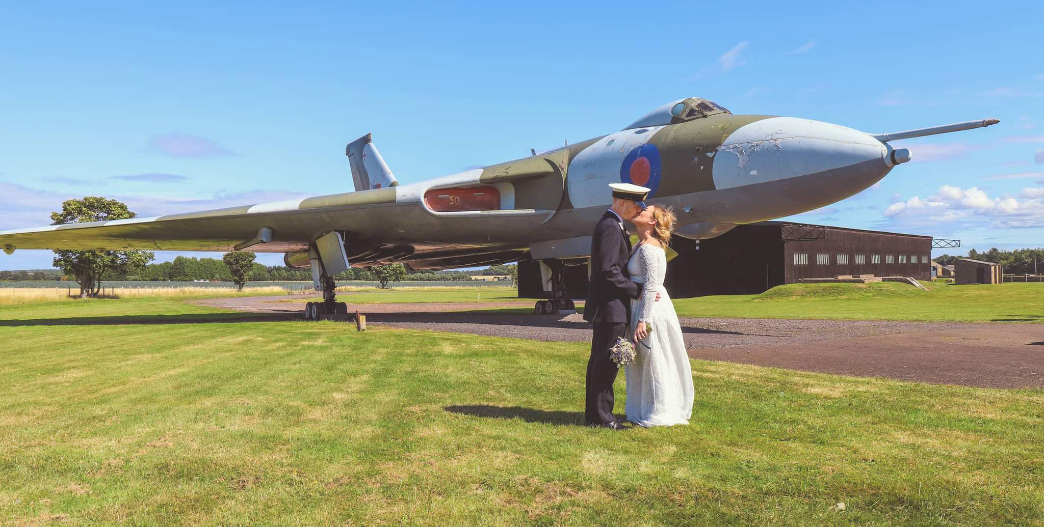A wedding at the National Museum of Flight.