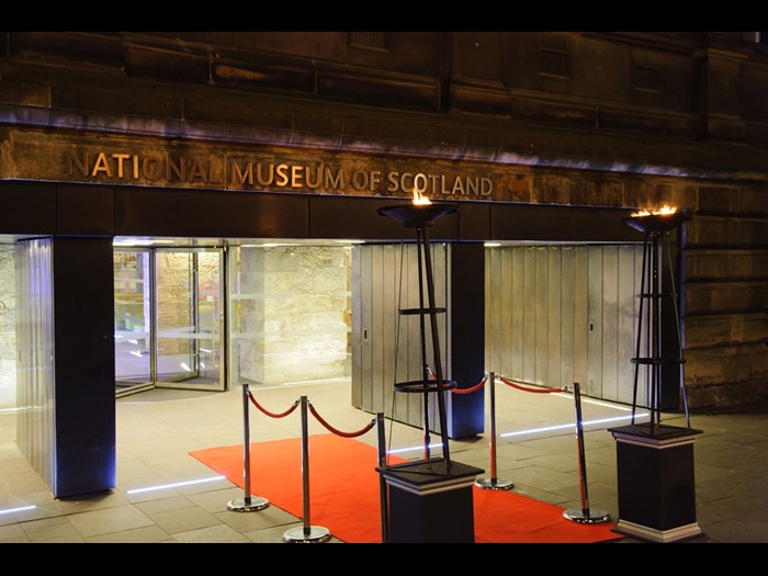 A red carpet entrance at Chambers Street entrance to National Museum of Scotland.