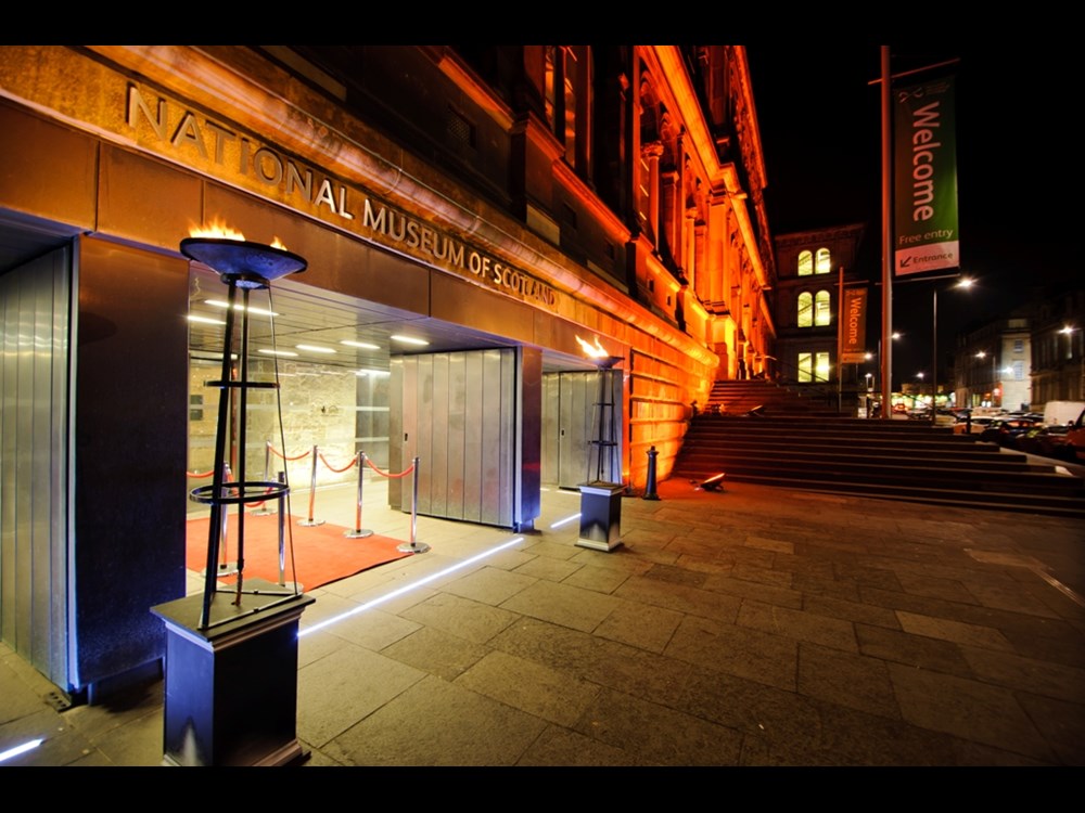 Chambers Street entrance to the National Museum of Scotland at night.