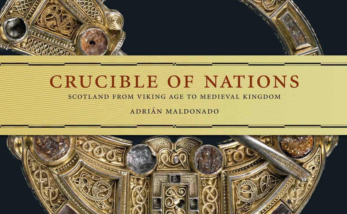 Book cover with black background. An elaborate golden brooch fills most of the cover, with a yellow banner giving the title 'Crucible of Nations'.
