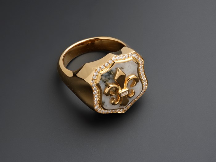 Singet ring of Scottish gold from Scotland’s first commercial gold mine (in Cononish Glen), and made by Hamilton & Inches Ltd of Edinburgh, 2019. X. 2020.22. Not only is the ring made from Scottish gold, it is set with a piece of quartz from the mine. This quartz is the host rock for the gold, deep under the mountain Beinn Chùirn in Loch Lomond and the Trossachs National Park. 