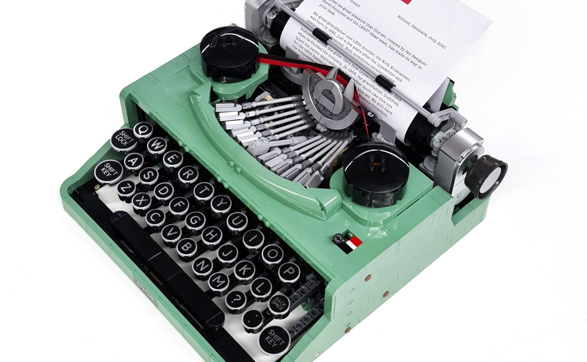 Green mechanical typewriter with round black keys