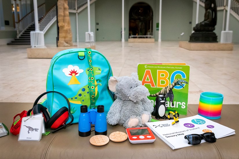 Items of a sensory backpack laid out on a chair. 