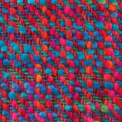 Sample of tweed entitled Aurora, woven in multiply wool slub and multiply wool and polyester and wool yarns, in light and dark blue, orange, red, pink, purple and green (1964–65). © Bernat Klein.