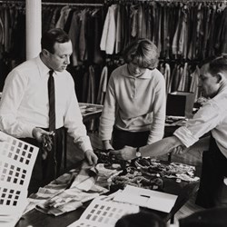 Bernat Klein selecting cloth and yarn samples.