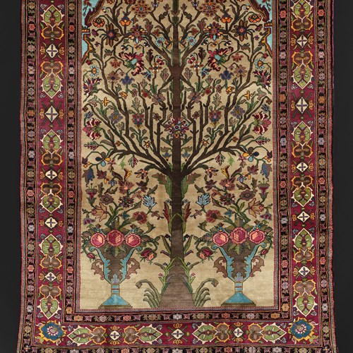 Detail of a flowering tree, silk rug, by Hajji Molla Mohammad Hasan Mohtasham, Kashan, Iran, c. 1850-60 (A.1899.280)