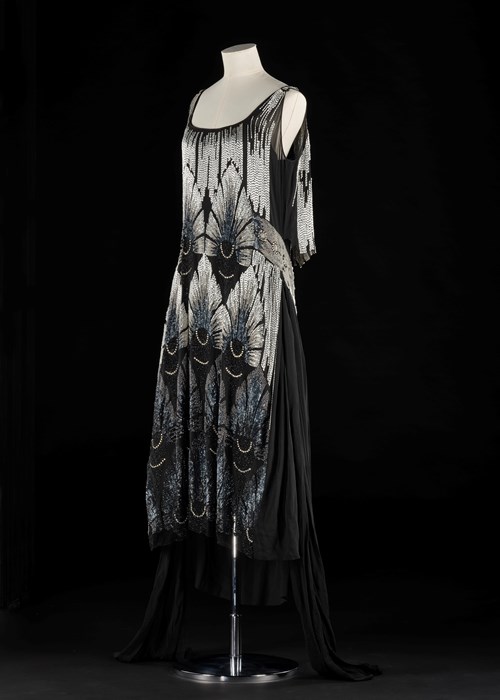 Mannequin wearing a woman's evening dress by an unknown designer