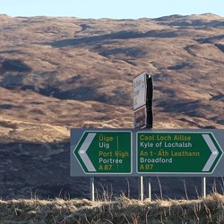 Gaelic-English road sign located by the Old Bridge over the River Sligachan on Skye.