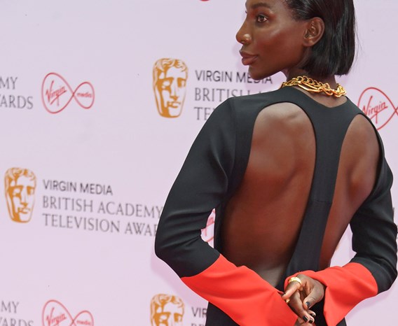 Maximilian, Spring Summer 2021. Michaela Coel Arrives At The Virgin Media British Academy Television Awards 2021 In Maximilian Dress Red Cuffs. Photo By David M. Benett, © Dave Benett Getty Images.