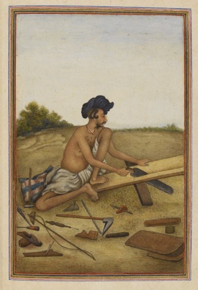 A painting of a man sitting outside in a landscape setting, wearing a white
covering on his lower half and a small blue hat or turban and using a saw to cut a
plank of wood. Surrounding him are other tools that a wood worker or crafts person
might use.