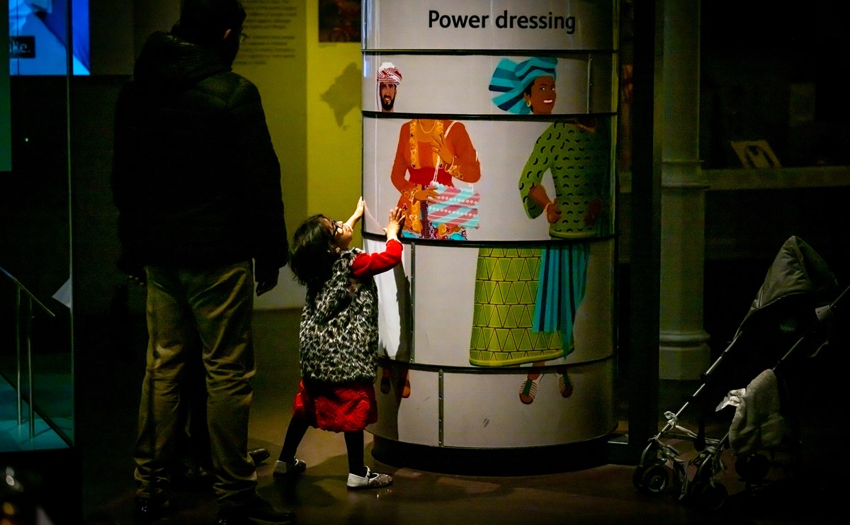 Child interacting with a display in the Patterns of Life gallery. 