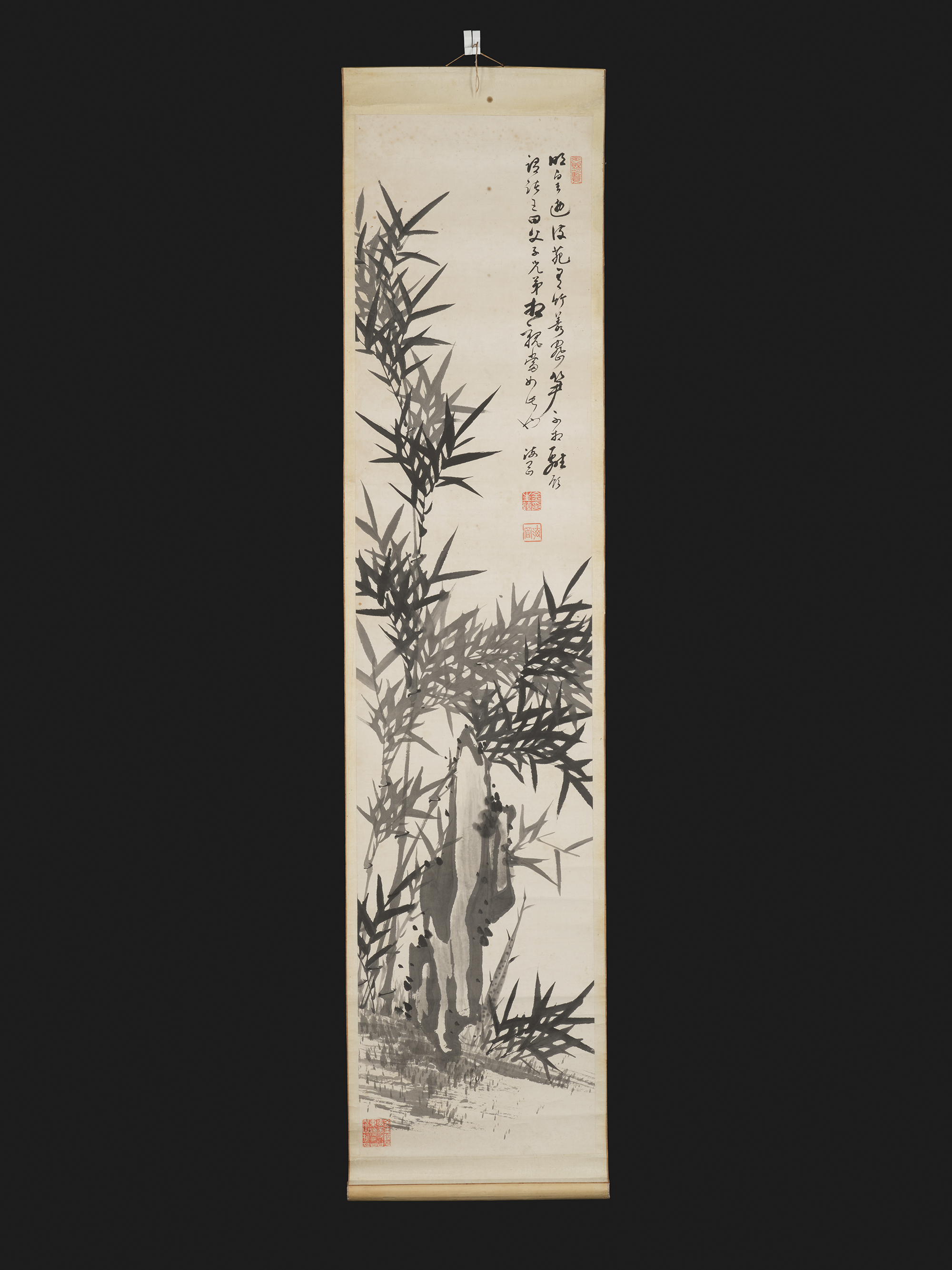 Hanging scroll painting of bamboo, seals and a signature.