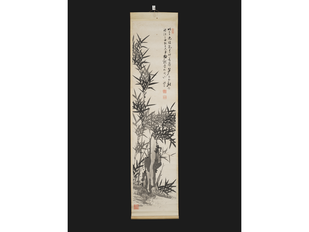 Hanging scroll painting of bamboo, seals and a signature.